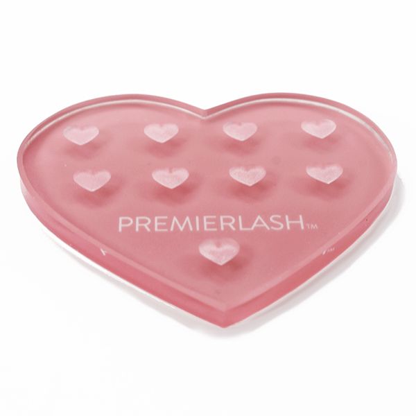 "Heart Shape Adhesive Crystal 1 Unit PremierLash - A & E Beauty Supplies
9 Wells for thin viscosity adhesive
Reverse side is a smooth, flat surface
Material: Glass
Reusable
To use: Clean with a PremierLash Adhesive Remover"