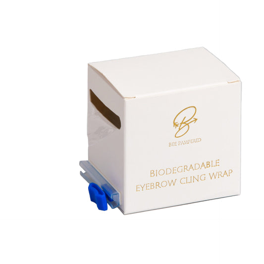 Biodegradable cling film roll, eco-friendly and designed for use in beauty treatments like brow lamination and lash lifting, displayed on a clean, neutral background