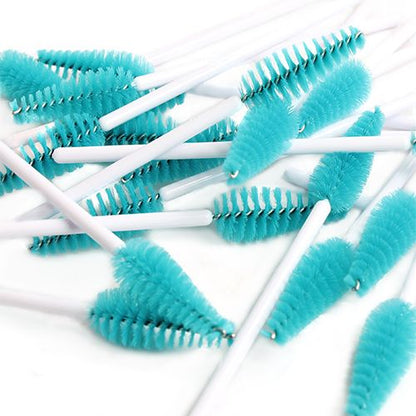 A set of tear-drop-shaped PremierLash mascara wands, designed for precise lash application and grooming, featuring sleek black handles and unique brush heads, displayed on a clean, neutral background.